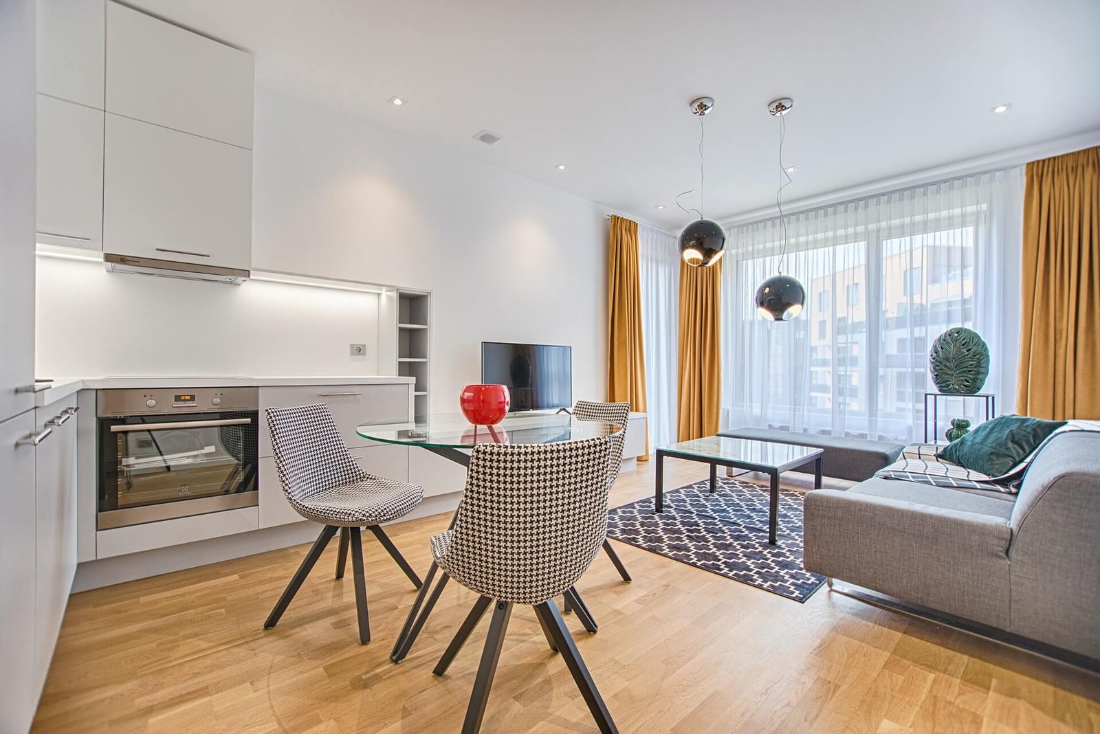 two-chairs-with-glass-table-on-living-room-near-window.jpg